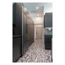 This modern kichen features TM9420 doors in MDF with flat panel inserts.