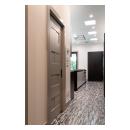 This modern kichen features TM9420 doors in MDF with flat panel inserts.