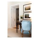 Harmon hinges allow these TS3140 doors to disappear into side pockets.