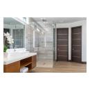 This master bath features TMIR6000 doors in mahogany with ½" bright stainless steel inlay. Builder provided stain finish.