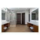 This master bath features TMIR6000 doors in mahogany with ½" bright stainless steel inlay. Builder provided stain finish.
