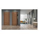 A living room features TMF1002 sketch face flush wood doors in Walnut with a clear coat finish.