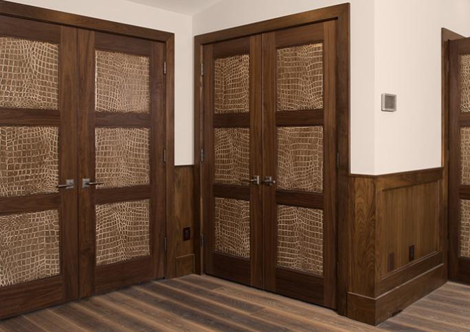 TS3000 doors in walnut with Edelman® Croc Nuts leather panels