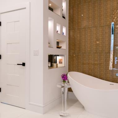 This modern master bath features TM9420 doors in MDF with flat panel inserts.