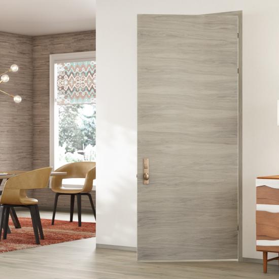 TMF1000 modern flush wood door in walnut with Bleached stain.