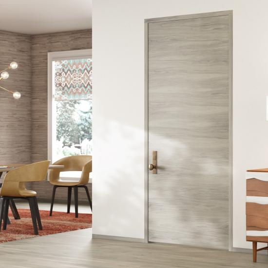 TMF1000 modern flush wood door in walnut with Bleached stain.