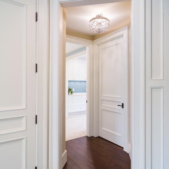 Hallway with TS3070 doors in MDF with Bolection moulding (BM) and Flat (C) panel.
